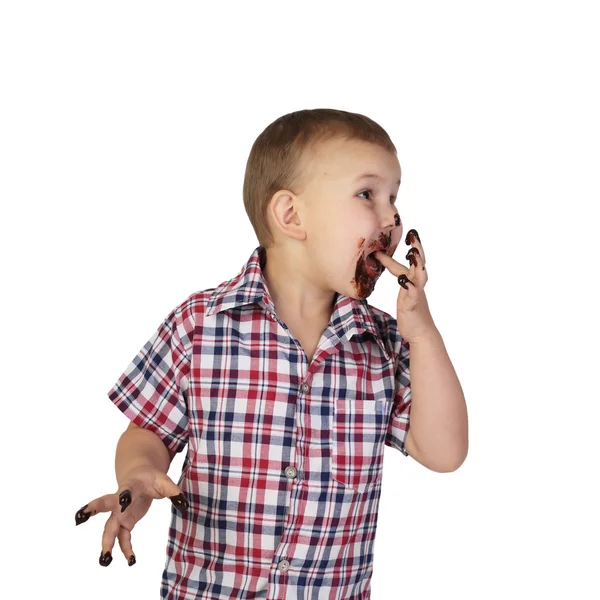 Мальчик, испачканный шоколадом — стоковое фото