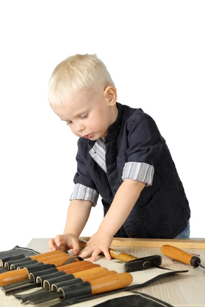 Ładny mały chłopiec w pracy kostium — Zdjęcie stockowe