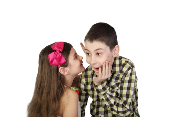 Girl telling secret to boy — Stock Photo, Image