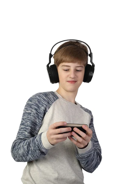 Teenege boy with cell phone on white background — Φωτογραφία Αρχείου