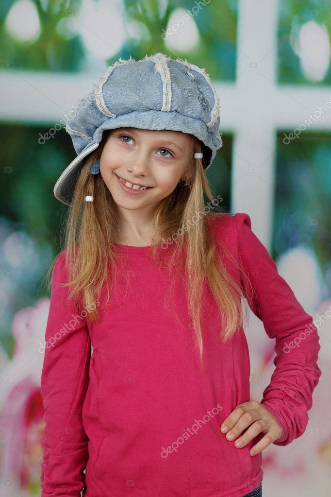 Cute girl in cap — Stock Photo © choocha69 127377228
