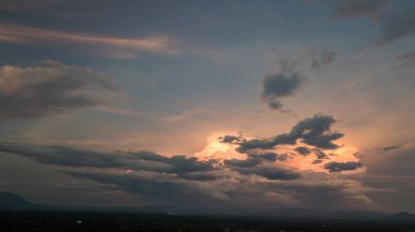 Last Light of sun during sunset sky with beautiful orange beam.