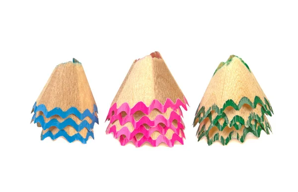 Shavings of colored pencils on a white background — Stock Photo, Image