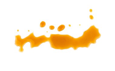 Beyaz arka plan üzerinde izole karamel sprey damla