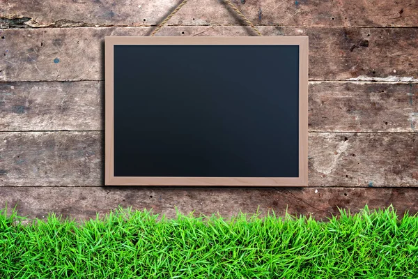 Grunge vintage wood wall with blackboard — Stock Photo, Image