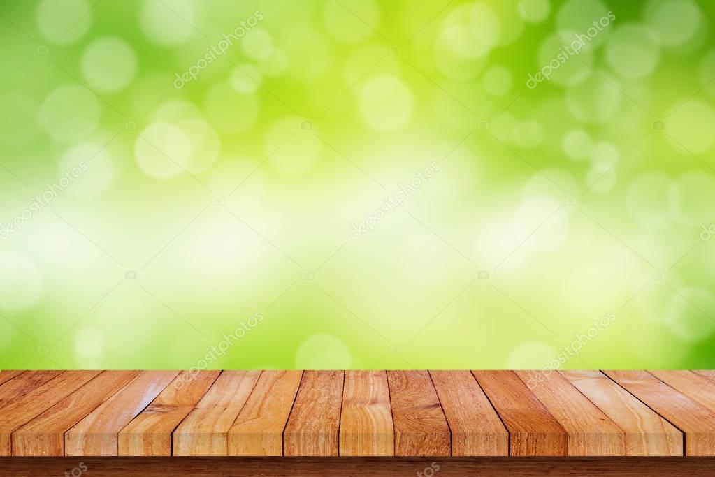 Wood floor with nature bokeh background — Stock Photo © jesadaphorn