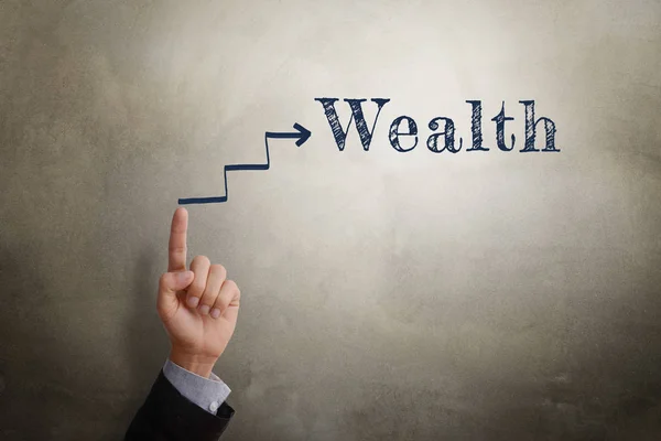 Hand point to step to wealth — Stock Photo, Image