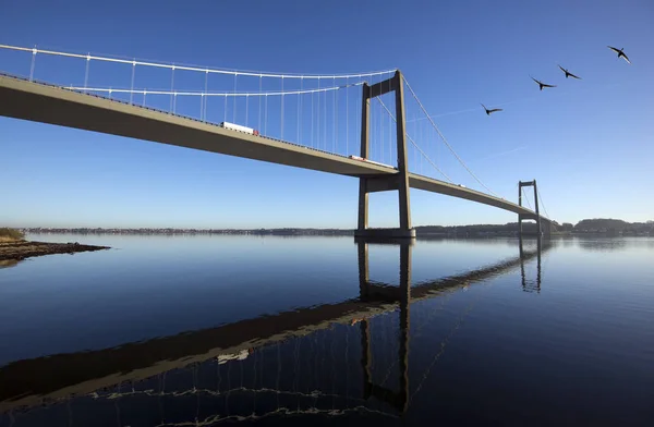 Sky blue Danish suspension bridge — Stock Photo, Image