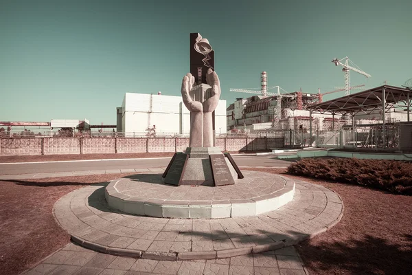 Monument van de vereffenaar in geval van het ongeval van Tsjernobyl Stockfoto