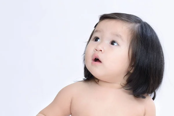 Retrato de closeup adorável menina dúvida isolado no branco de volta g Fotografia De Stock