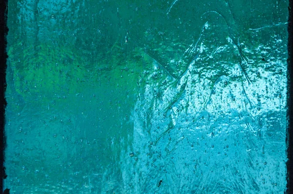 Dokulu, mavi renkli cam parçası closeup