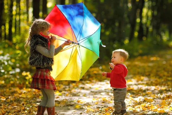 Happy child playing in a park — Stock Photo, Image