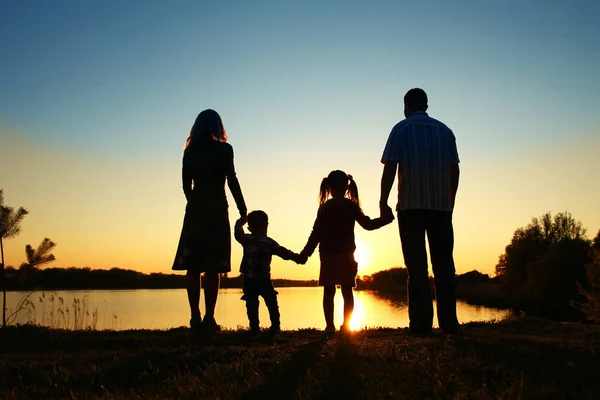 Silhouette of a happy family — Stock Photo, Image