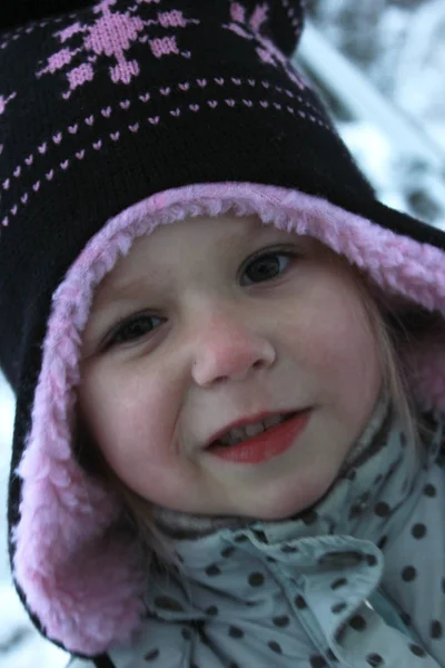 Happy child playing in winter — Stock Photo, Image