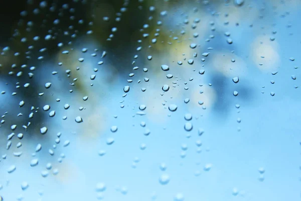 Regen druppels op glas van venster — Stockfoto