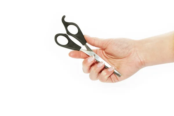 Metal scissors in hand — Stock Photo, Image