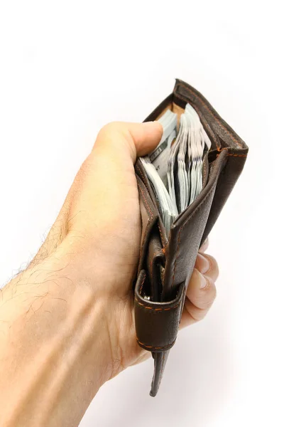Dollars argent dans votre portefeuille et les mains sur un fond blanc — Photo