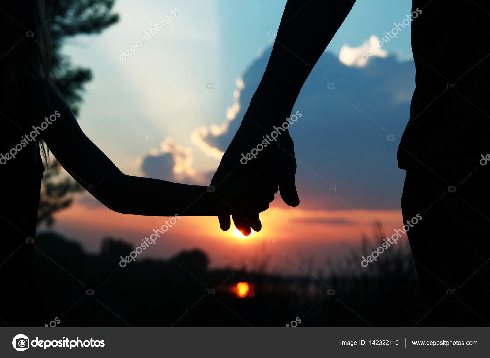 Hands Of Parent And Child Silhouette On Nature Stock Photo By C Kostia777 Hands Of Parent And Child Silhouette On Nature Stock Photo By C Kostia777