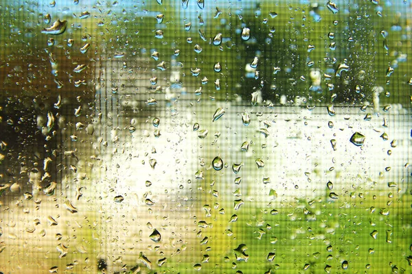 Fondo salpicaduras a través del vaso de la naturaleza del agua —  Fotos de Stock