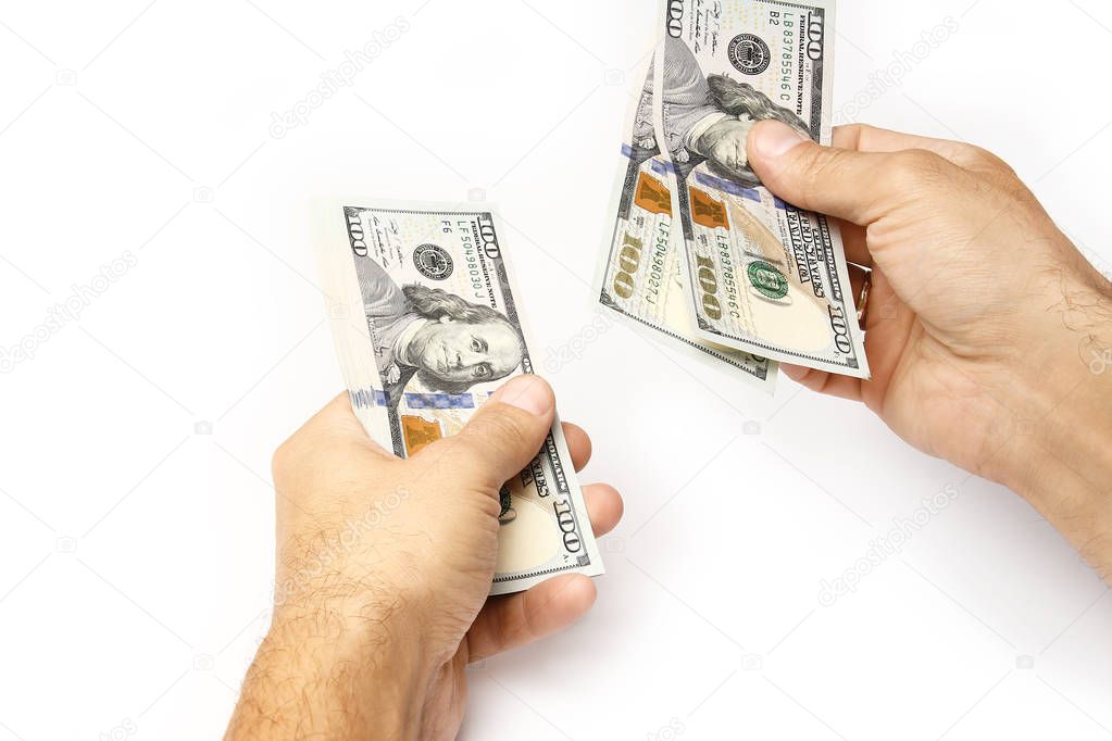 Business Money dollars in the hands on a white background