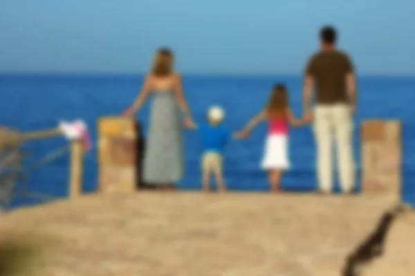 Glückliche Familie am Strand — Stockfoto