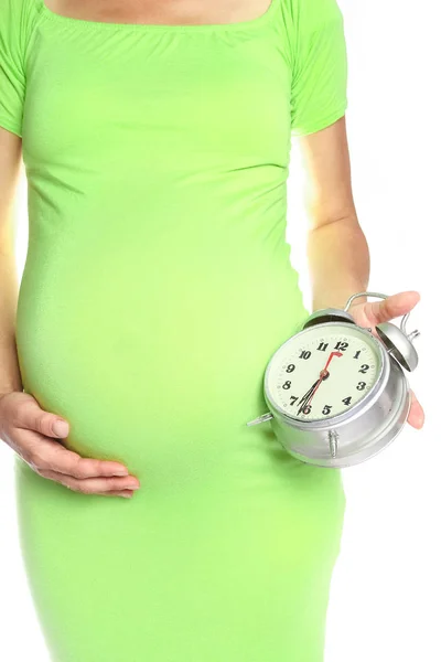 Happy pregnant girl lies on white background — Stock Photo, Image