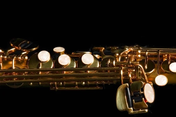 soprano saxophone on black background