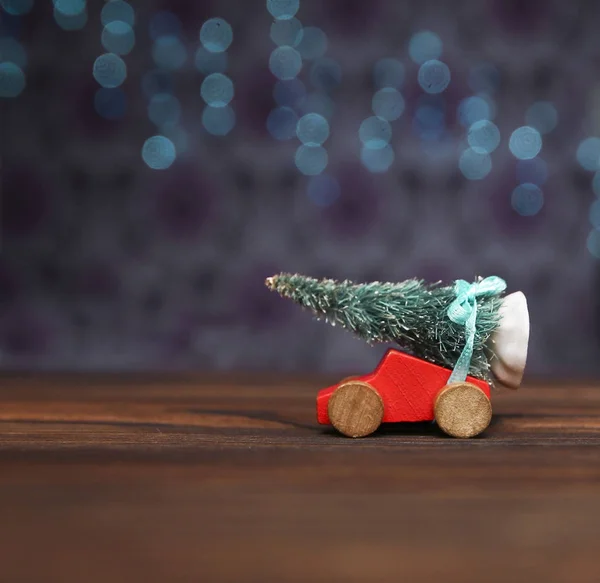 Christmas tree on a toy car — Stock Photo, Image