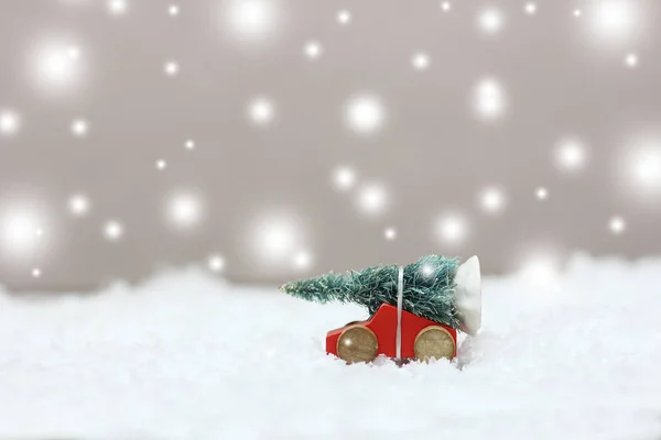 Christmas tree on a toy car — Stock Photo, Image