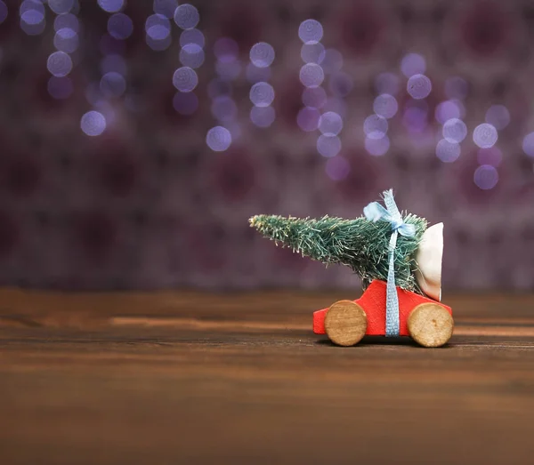 Christmas tree on a toy car — Stock Photo, Image