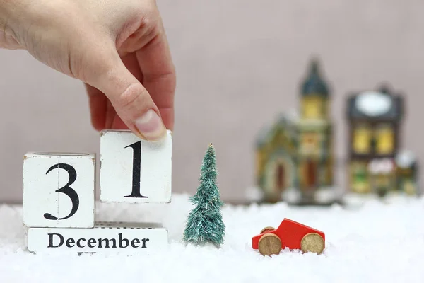 Деревянная рождественская дата на заднем плане — стоковое фото