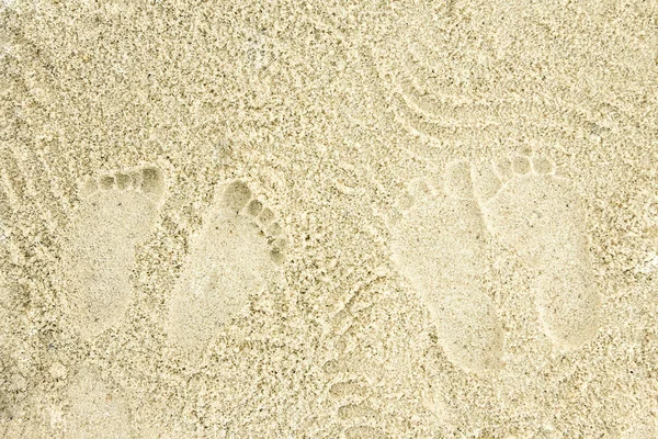 Beautiful pattern on the sea sand on nature background — Stock Photo, Image