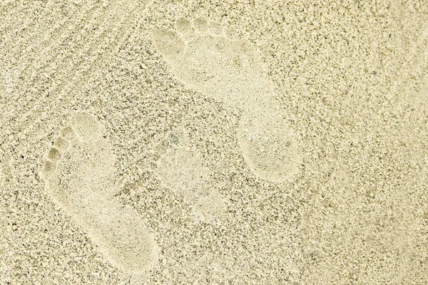 Schöne Muster auf dem Meeressand auf dem Hintergrund der Natur — Stockfoto