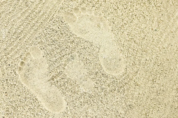 Beautiful pattern on the sea sand on nature background — Stock Photo, Image