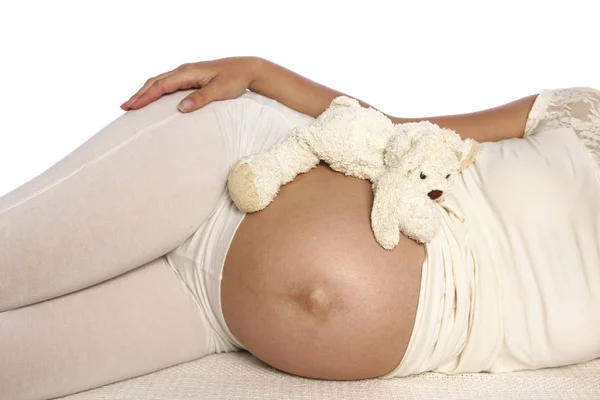 Pregnant woman on a white background — Stock Photo, Image