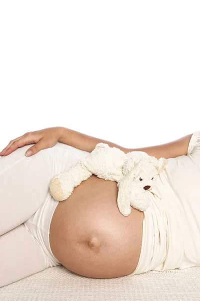 Pregnant woman on a white background — Stock Photo, Image