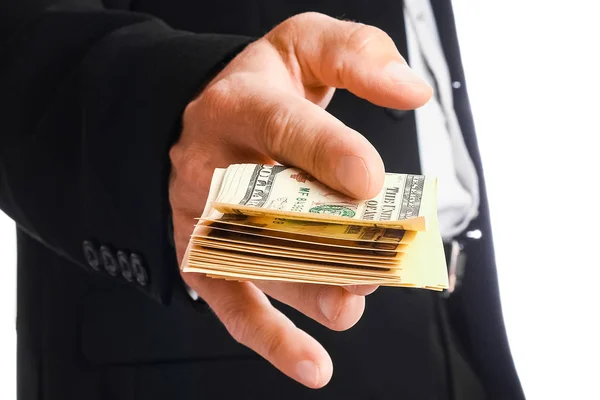 Business man holding money on white background — Stock Photo, Image