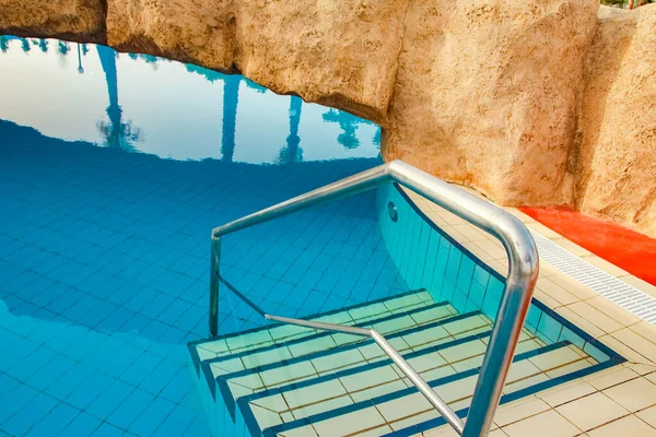 Beautiful pool with steps near the sea on nature background — Stock Photo, Image