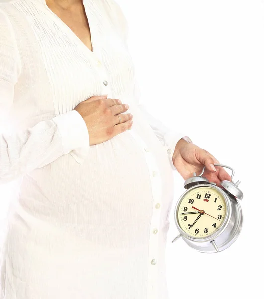 Mulher grávida em um fundo branco — Fotografia de Stock