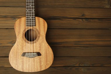 Ukulele üzerine ahşap arka plan