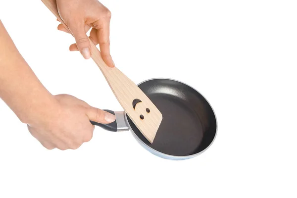 A pan in hands on a white background — Stock Photo, Image