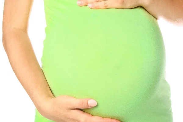 Happy pregnant girl lies on white background — Stock Photo, Image