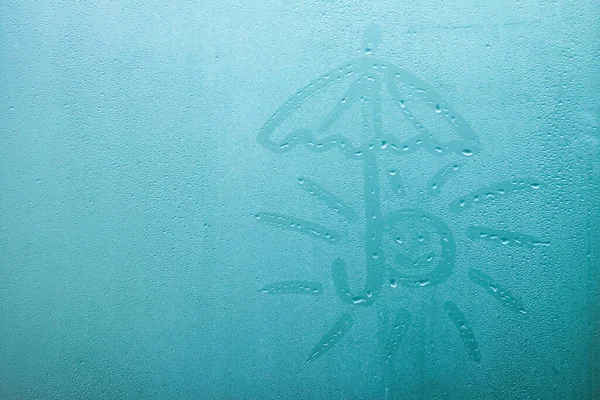 Payung Dengan Matahari Digambar Pada Jendela Kaca Dengan Latar Belakang — Stok Foto