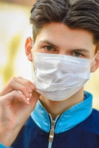 masked man from coronavirus and air. Protection against PM 2.5 air polluted from the virus in Europe and Asia