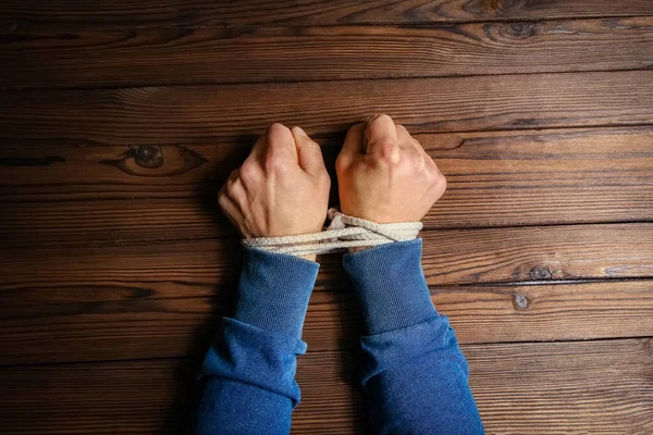 Hands Tied Rope Life Threatening Wooden Background Slavery Business Human — Stock Photo, Image