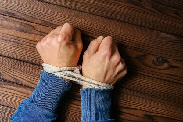 Hands Tied Rope Life Threatening Wooden Background Slavery Business Human — Stock Photo, Image