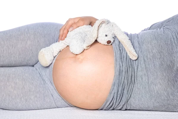 Glücklich Schwangeres Mädchen Liegt Auf Weißem Hintergrund — Stockfoto