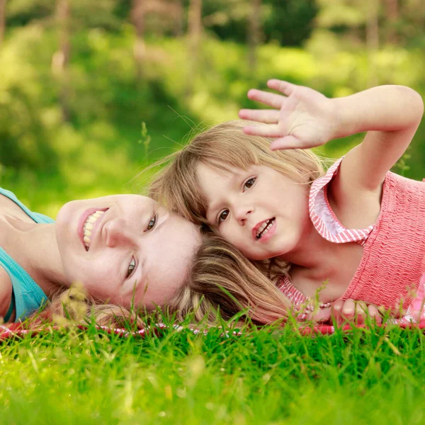 Mother Her Happy Little Daughter Lie Grass — Stock Photo, Image