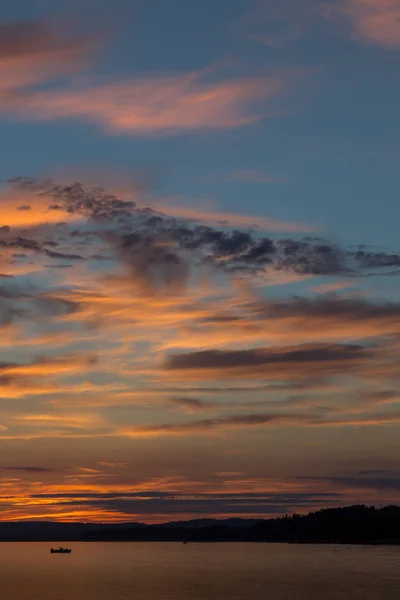 Fisherman at sunset — Stock Photo, Image