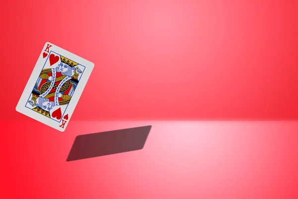 Hearts King Card Flying Red Background — Stock Photo, Image